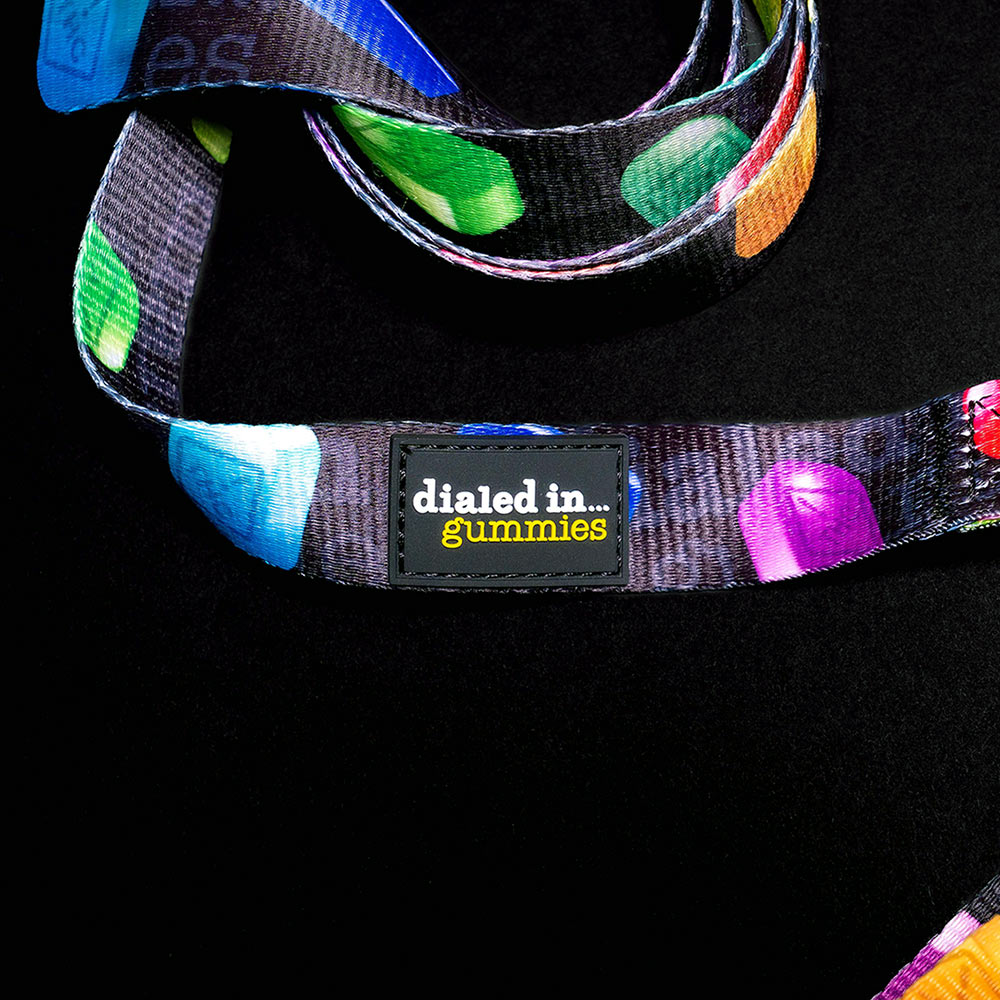 view of a rubber label on brightly colored leash