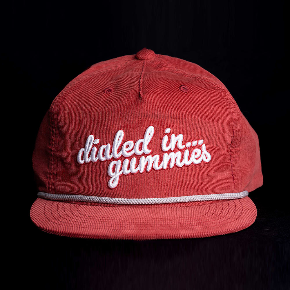 maroon corduroy 6-panel hat with a dialed in... gummies logo in script